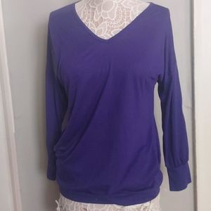 Purple long sleeve, vneck top with pockets